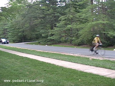 Sidewalk without a curb.