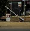Photo - damaged bus stop (2317 bytes)